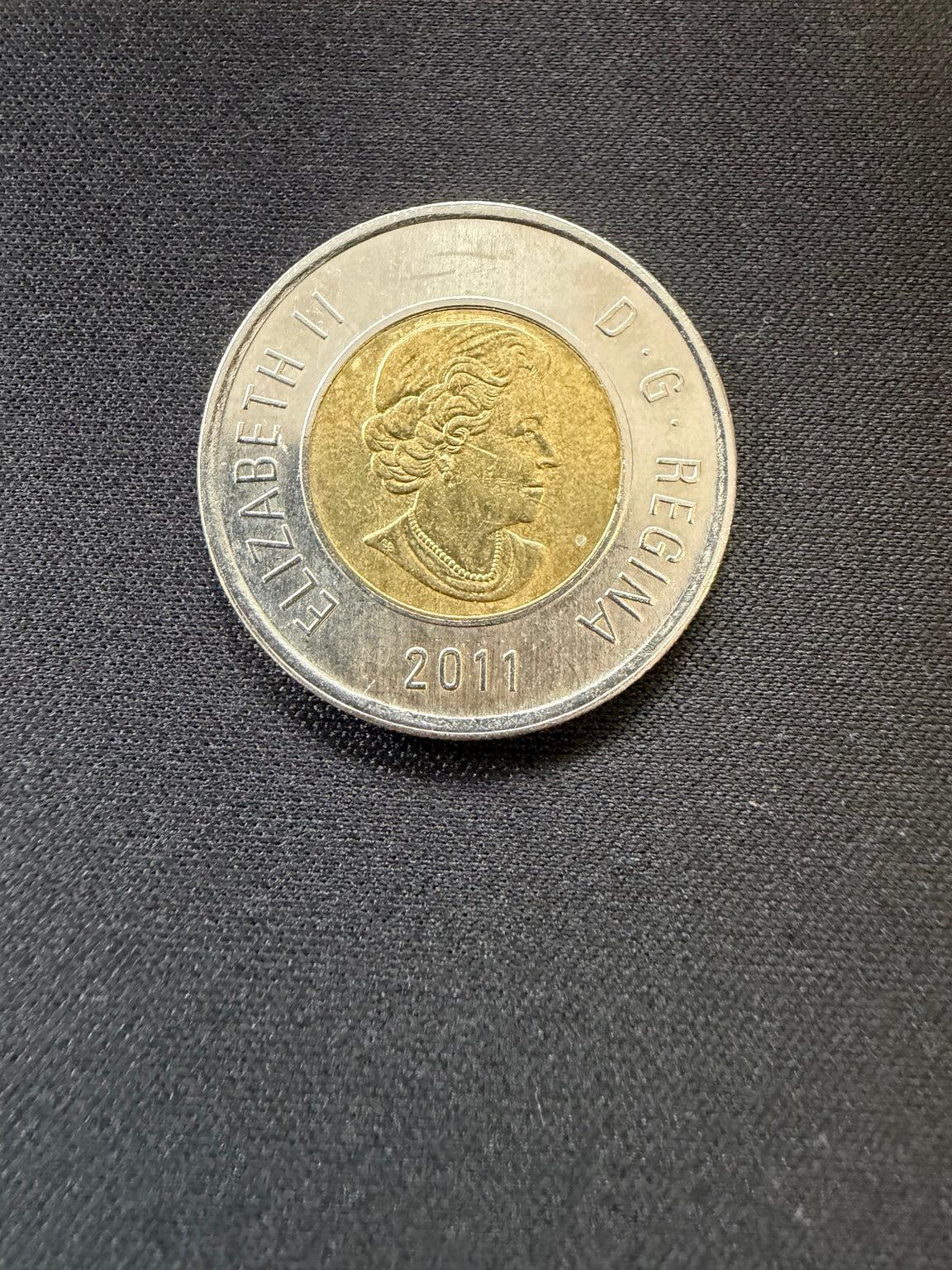 Representative 2011 Boreal Forest circulated toonie, obverse
