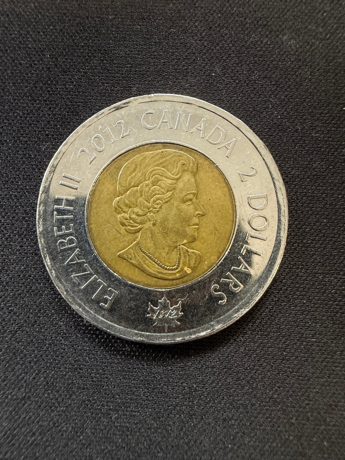 Representative 2012 HMS Shannon circulated toonie, obverse