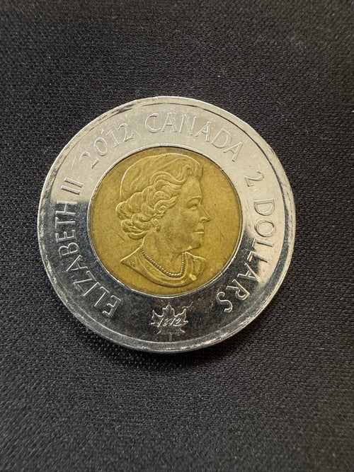 Representative 2012 HMS Shannon circulated toonie, obverse