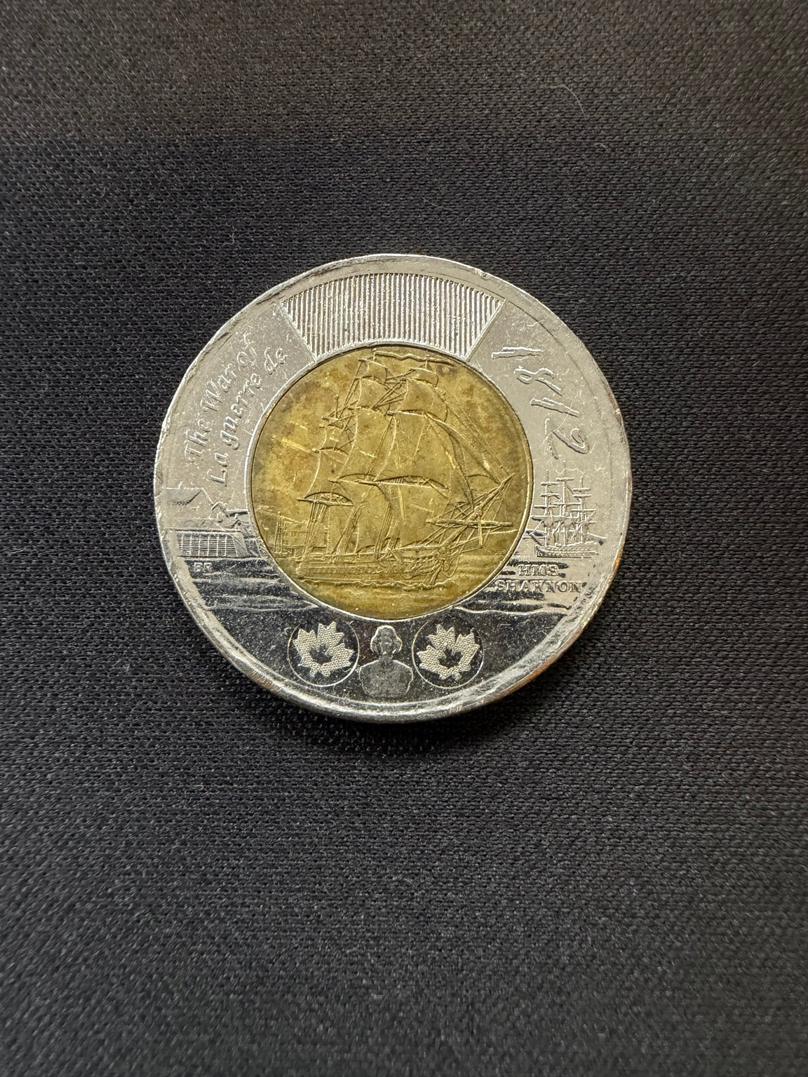 Representative 2012 HMS Shannon circulated toonie, reverse