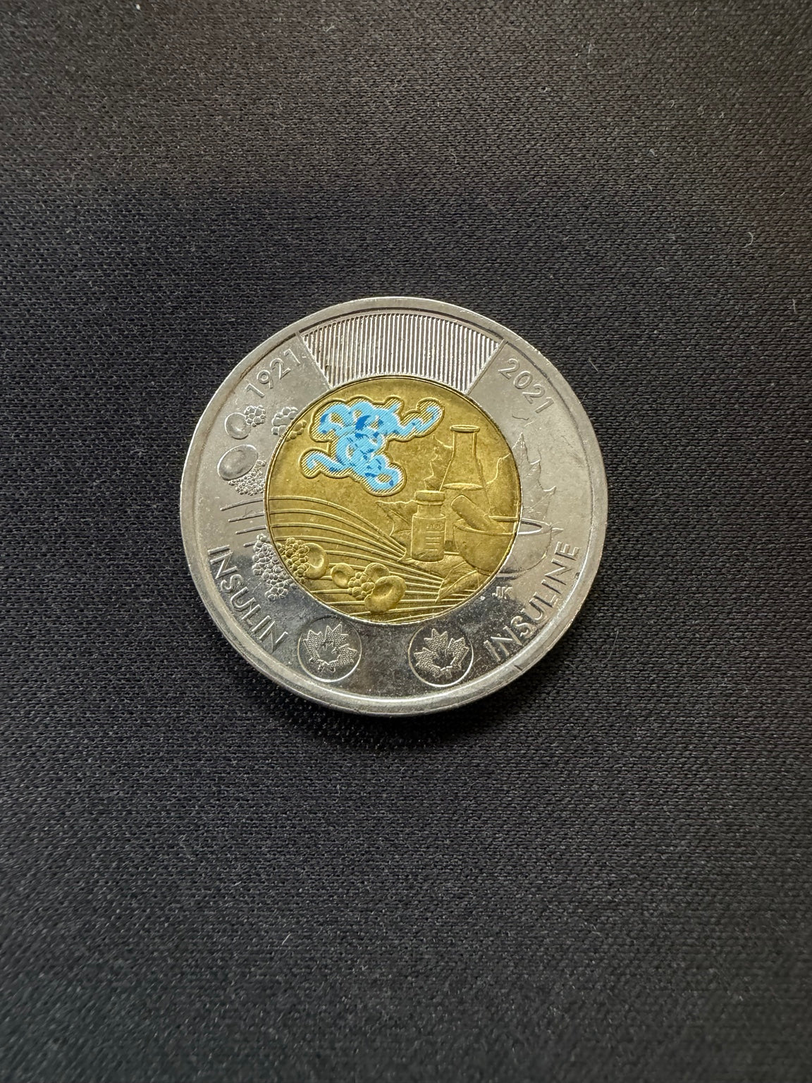 Representative 2021 Insulin colourized circulated toonie, reverse