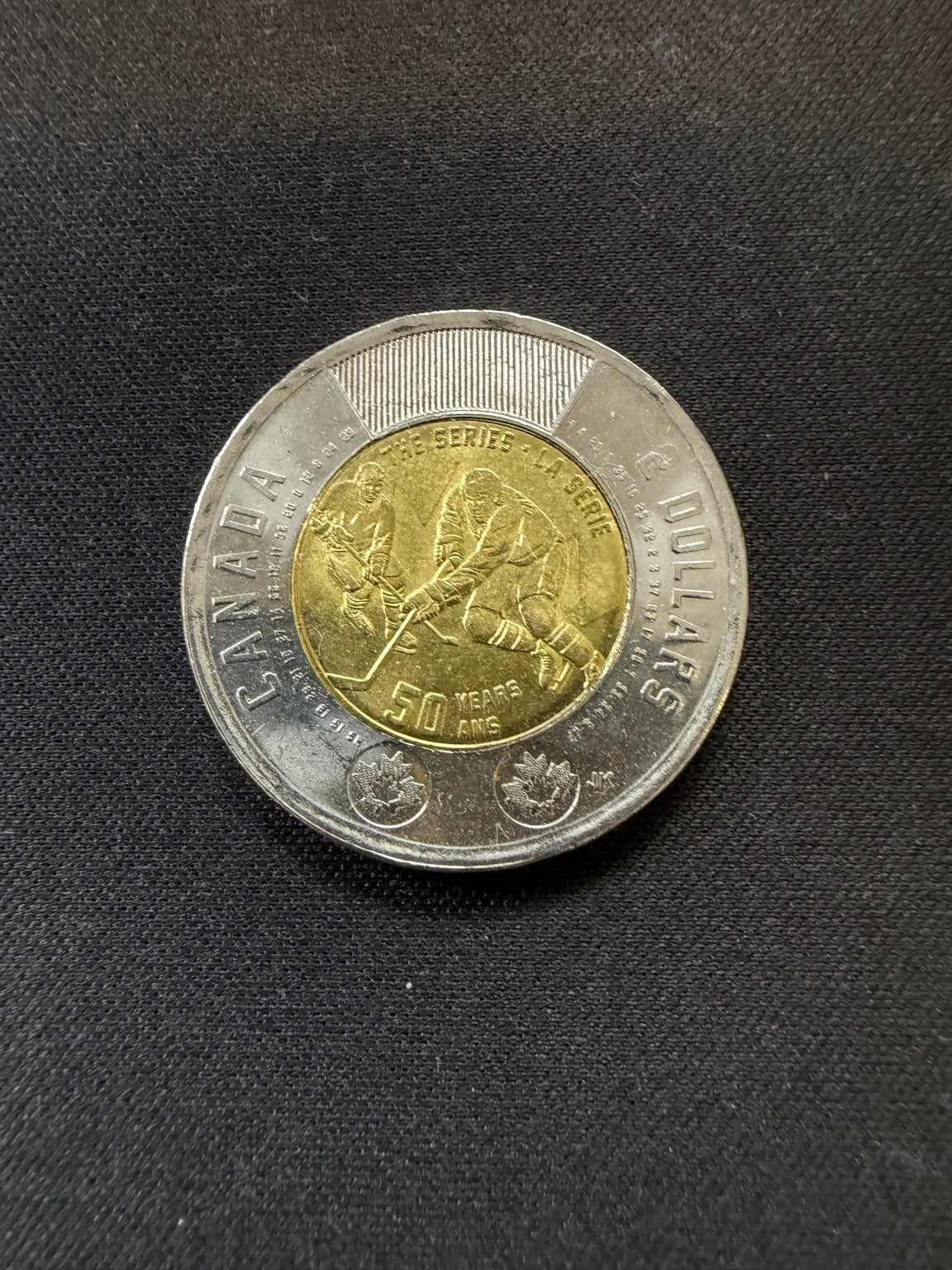 Representative 2022 Summit Series uncolourized circulated toonie, reverse
