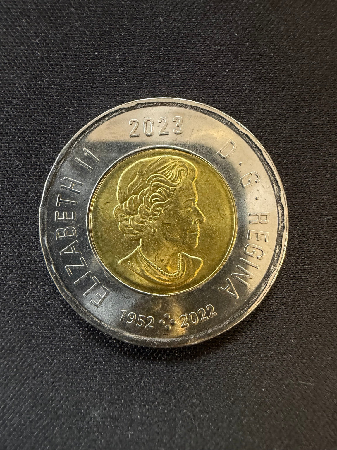 2023 Indigenous Peoples Day colourized toonie obverse, representative circulated coin