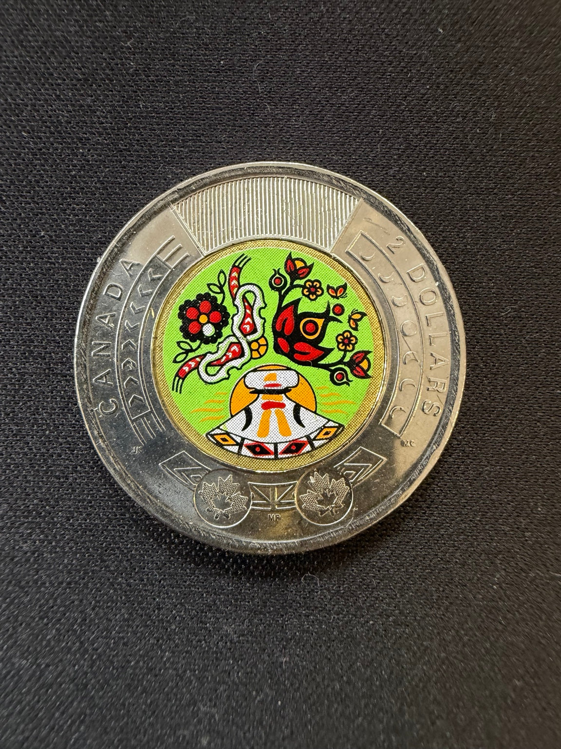 2023 Indigenous Peoples Day colourized toonie reverse, representative circulated coin
