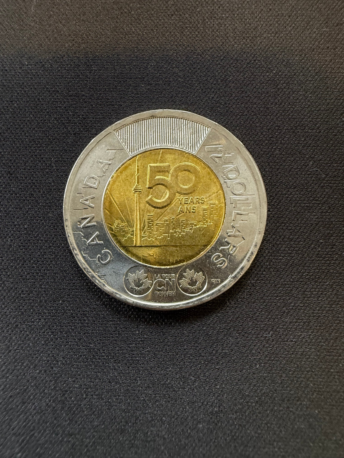 2026 CN Tower uncolourized toonie reverse, representative circulated coin