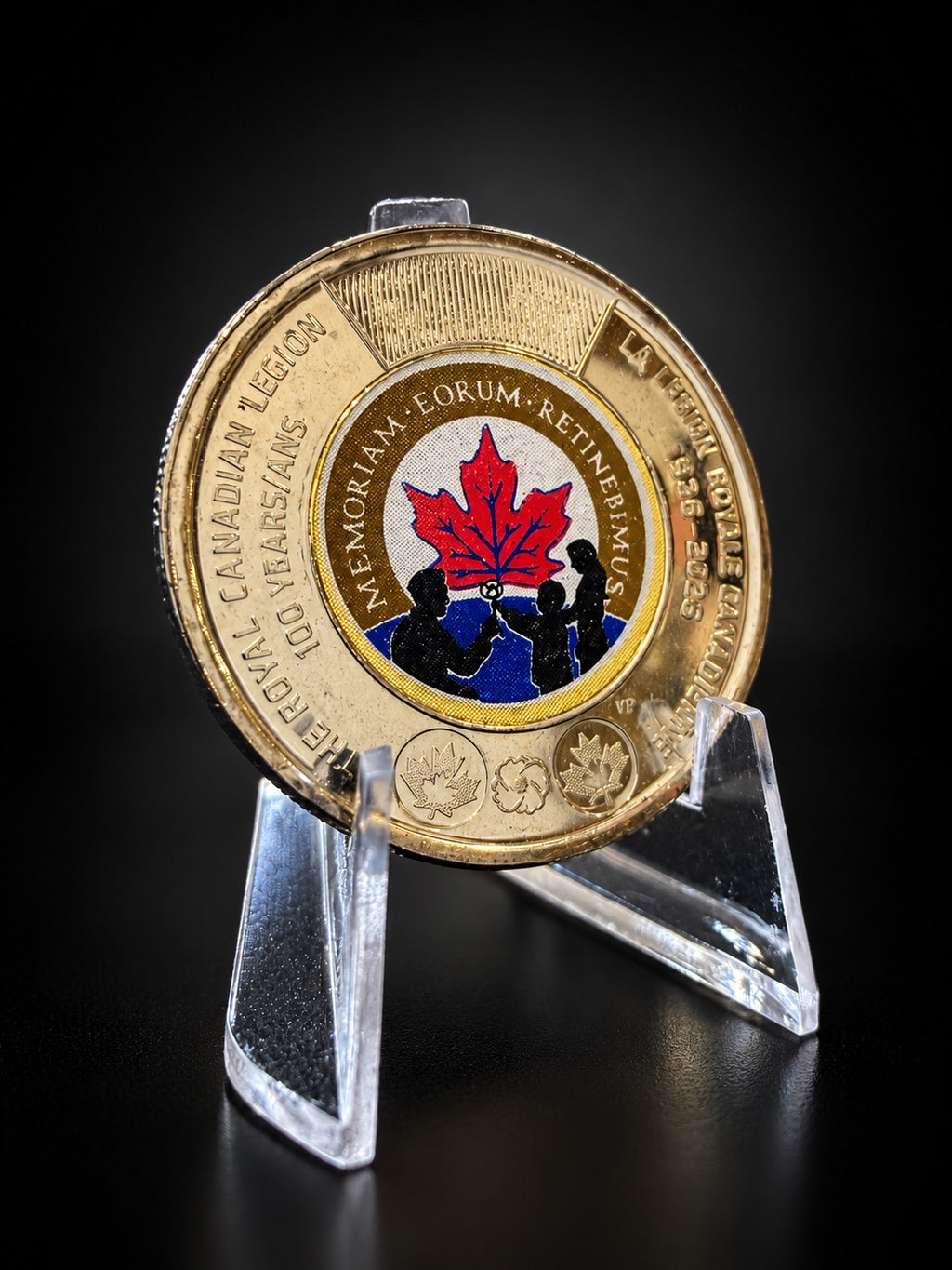 2026 Royal Canadian Legion 100th anniversary toonie, colourized on stand