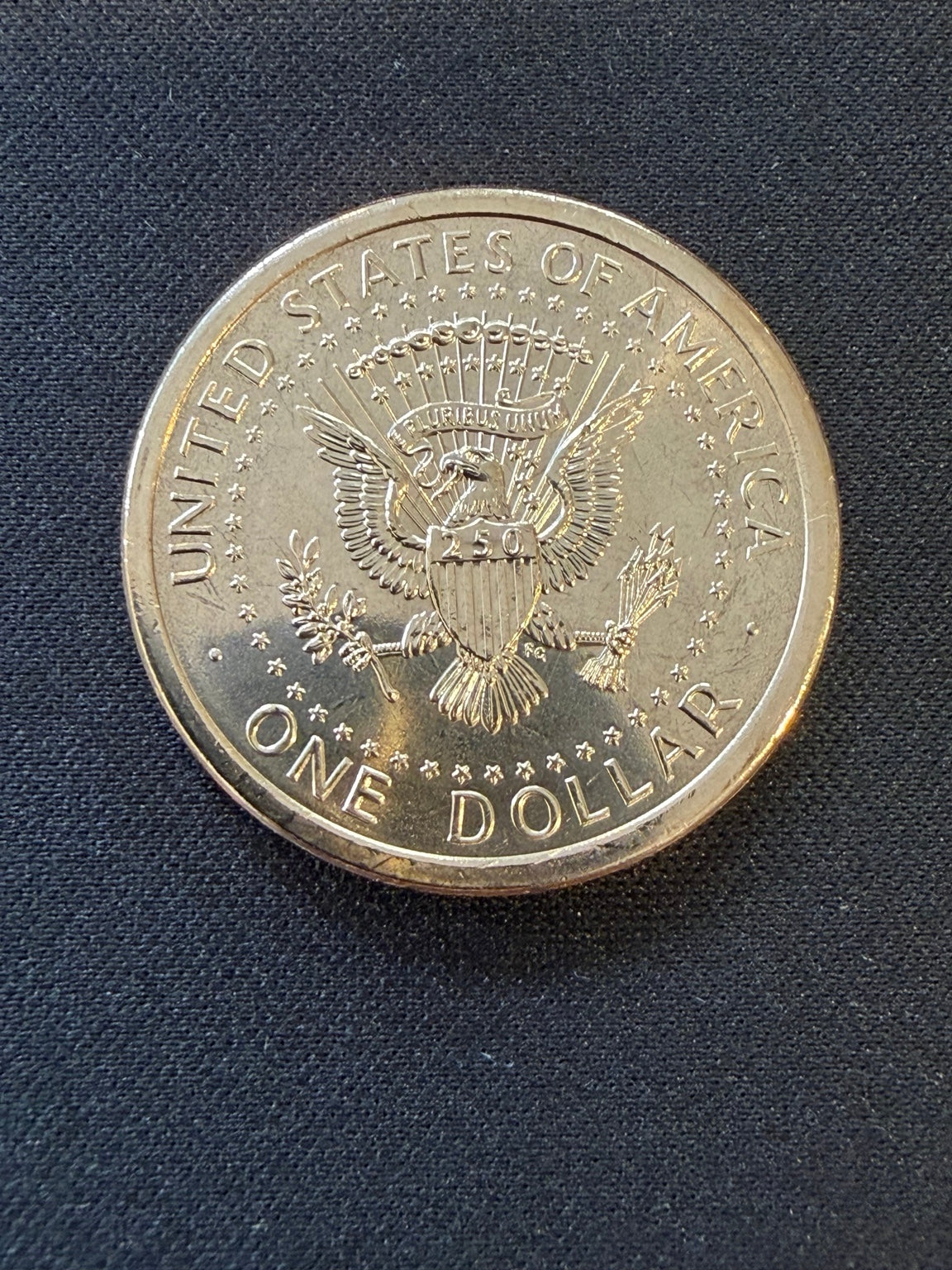 Semiquincentennial dollar eagle reverse close-up